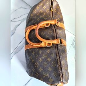 Authentic LV speedy 45. Used , small tear at zip area, overall used condition.